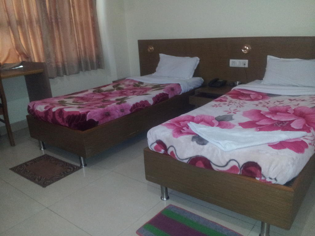 Hotel Fame City Γουβαχάτι Δωμάτιο φωτογραφία